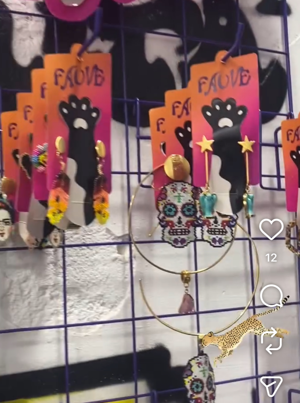 Fauve market stand with colourful earrings