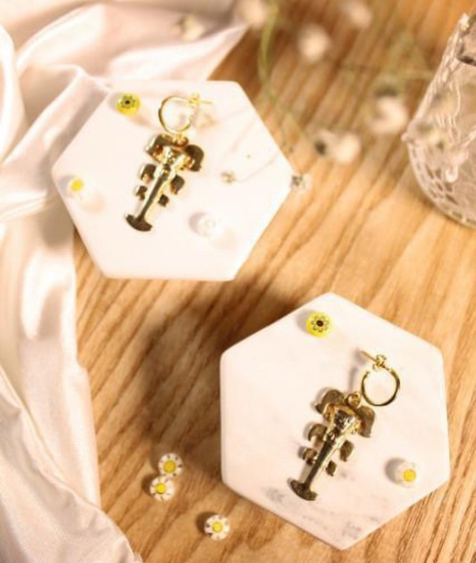 Prehistoric Colombian-inspired earrings